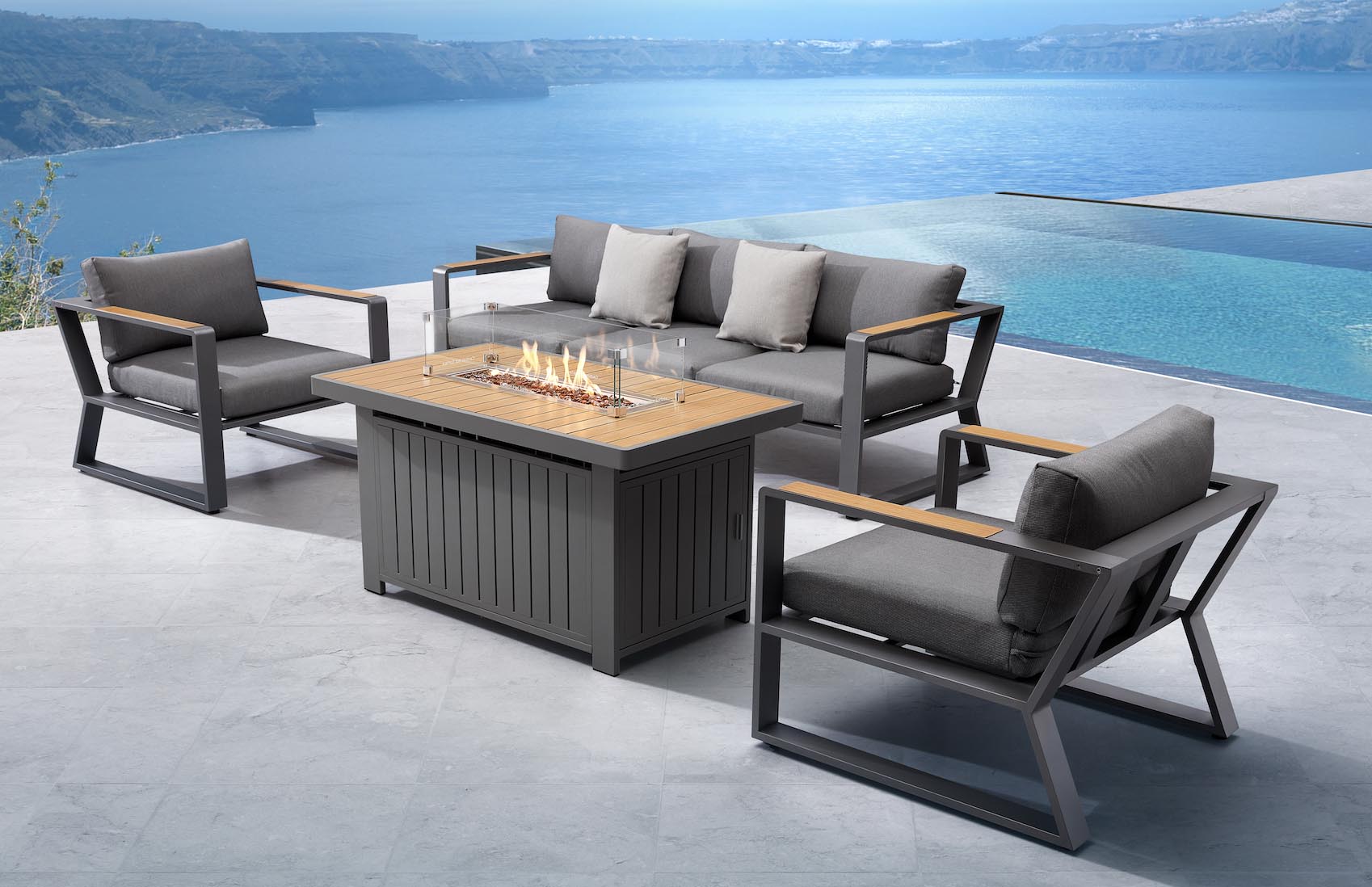Salon de jardin design innovant en aluminium haut de gamme noir avec table centrale en teck FSC à peinture epoxy, fauteuils.