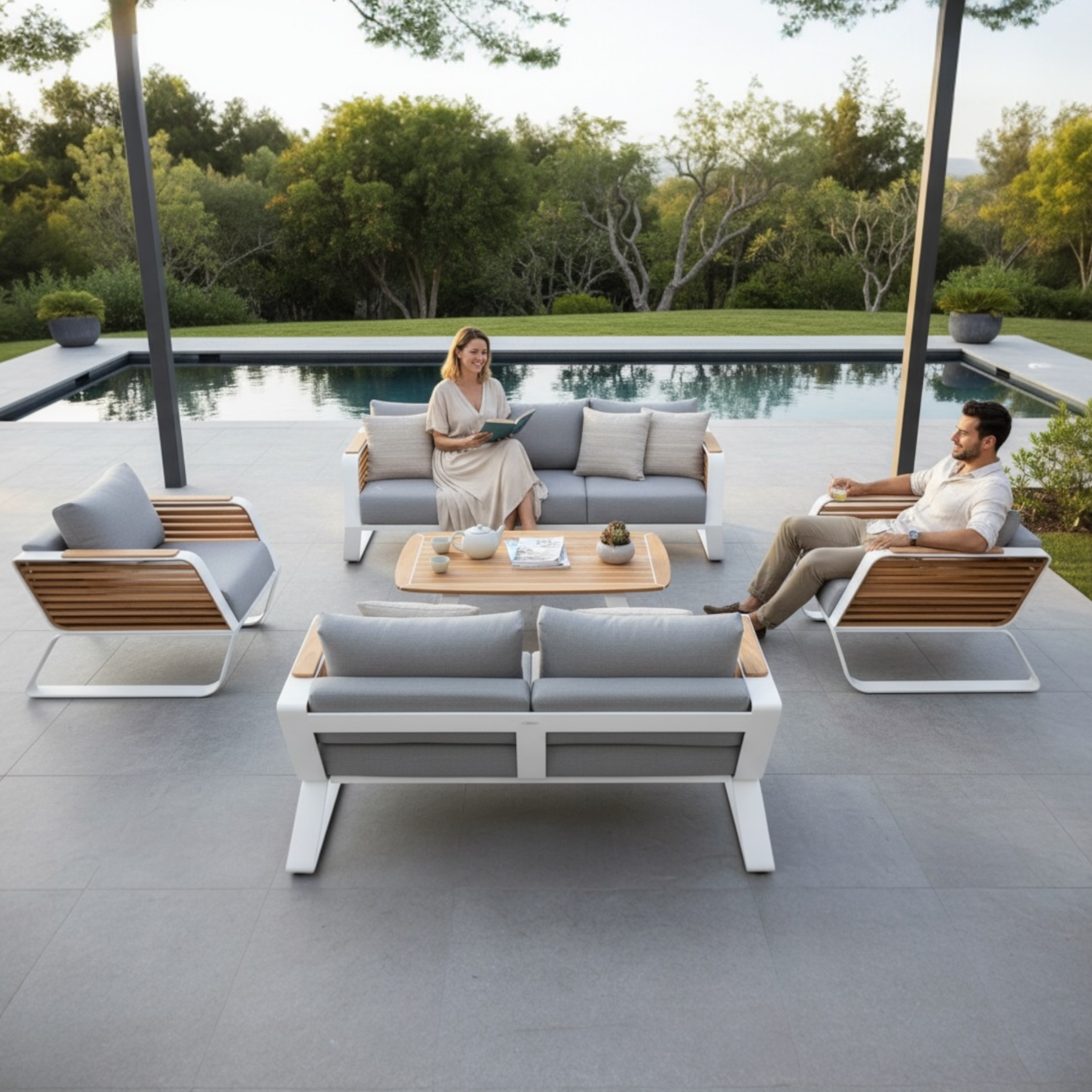 Salon de jardin AILY XL en aluminium blanc et teck installé en extérieur