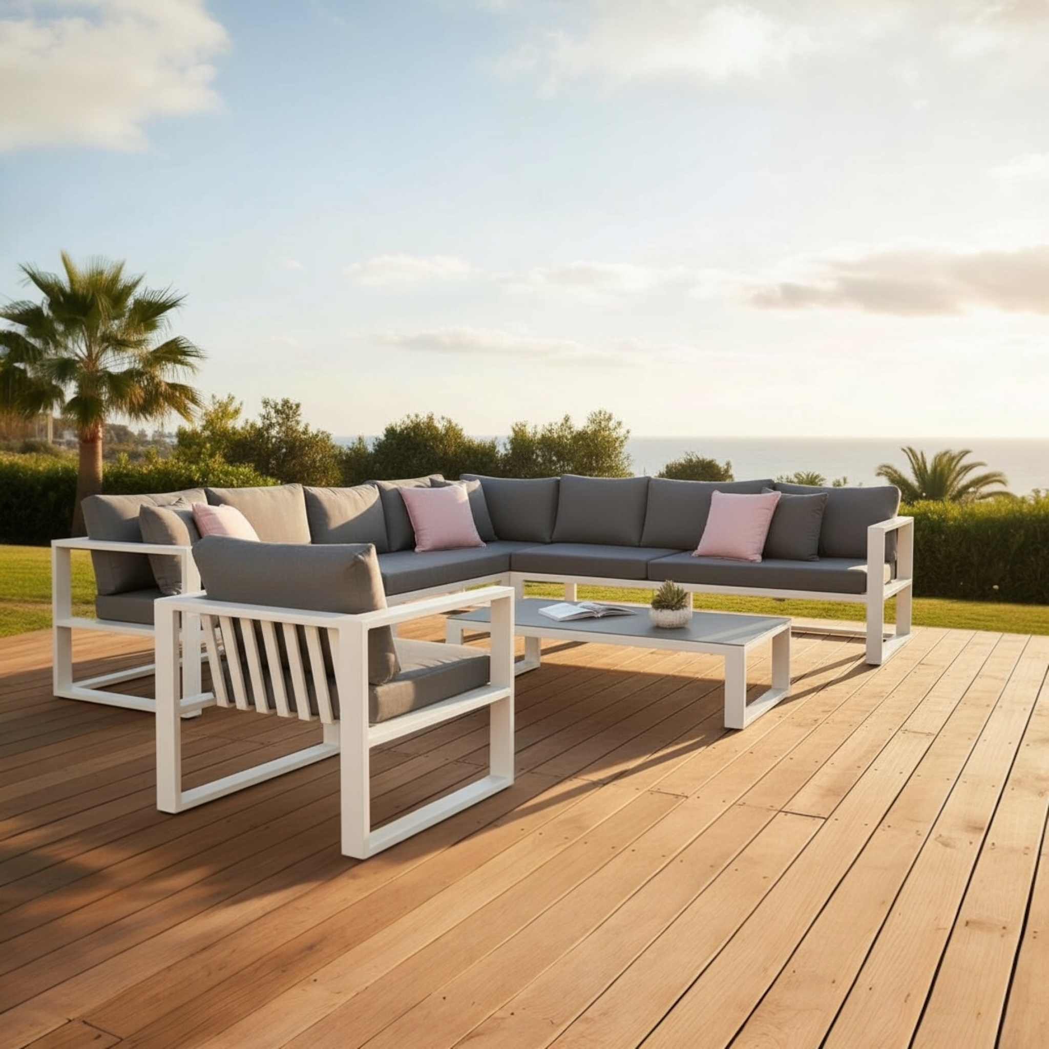 Salon de jardin haut de gamme modulable en aluminium blanc, coussins gris et roses, design élégant et durable sur terrasse.