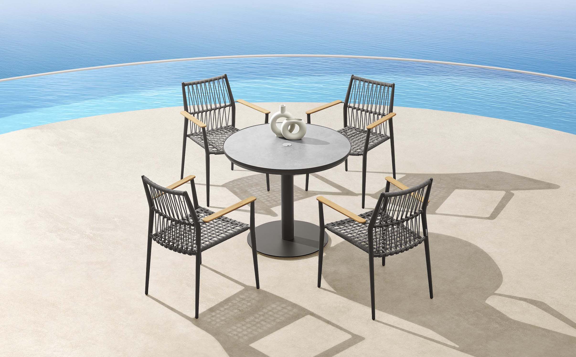 Table bistrot ronde noire en aluminium haut de gamme, pied central stable, design élégant pour terrasse de restaurant. 